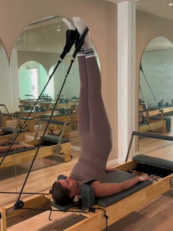 Reformer movement inside Akasa’s mirrored studio